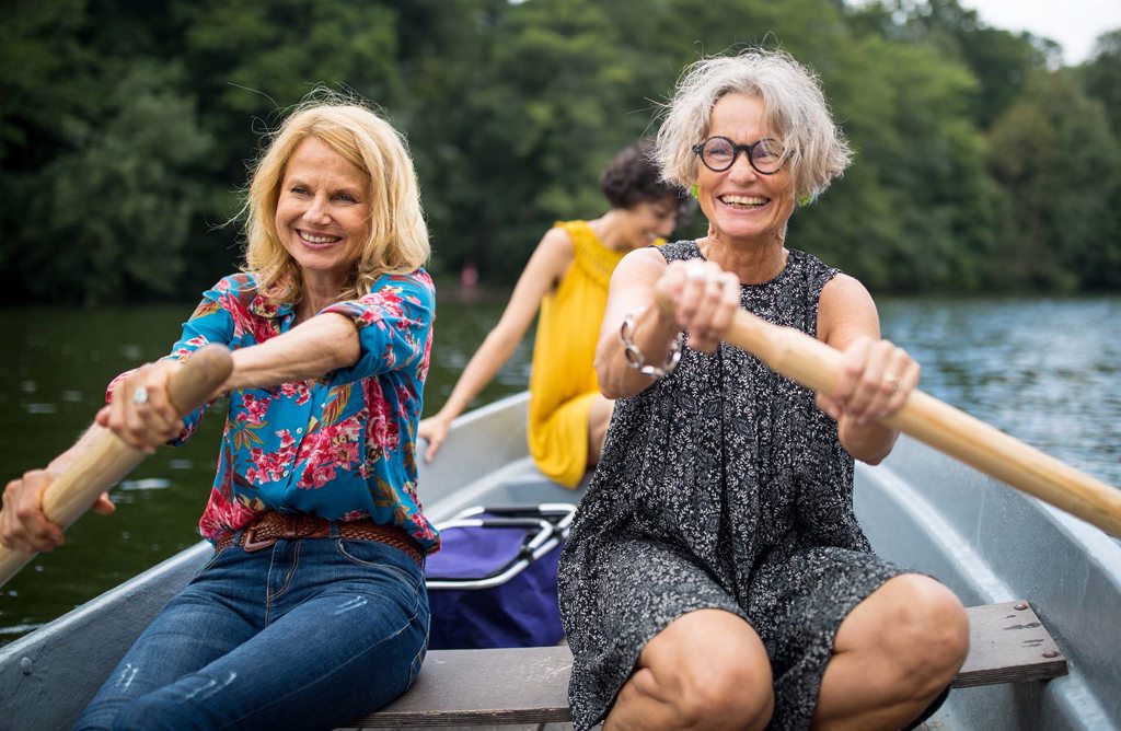 Women Rowing in Boat Women Rowing in Boat
